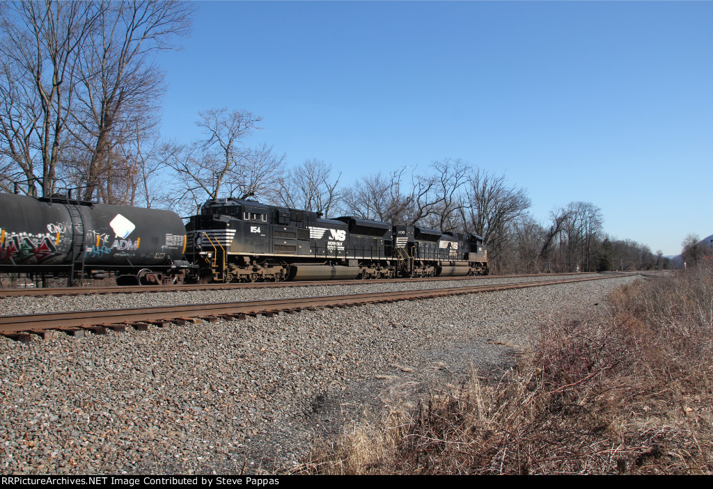 NS 1154 and 1108 take a train east past MP116